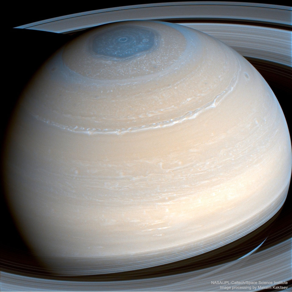 The featured image shows Saturn in infrared light as 
captured by the Saturn-orbiting Cassini spacecraft in 2014. 
Easily visible are many cloud bands, rings, and the hexagonal
cloud pattern surrounding Saturn's north pole. 
Please see the explanation for more detailed information.