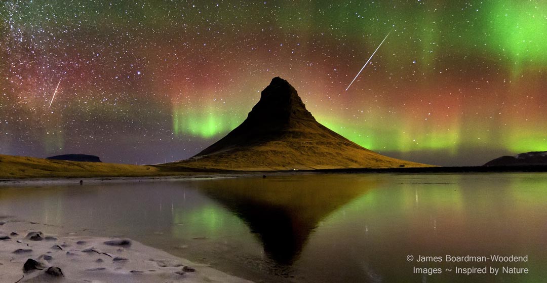 The picture shows a volcano in Iceland in the foreground and
both aurorae and meteors from the 2012 Geminids in the background.
Please see the explanation for more detailed information.