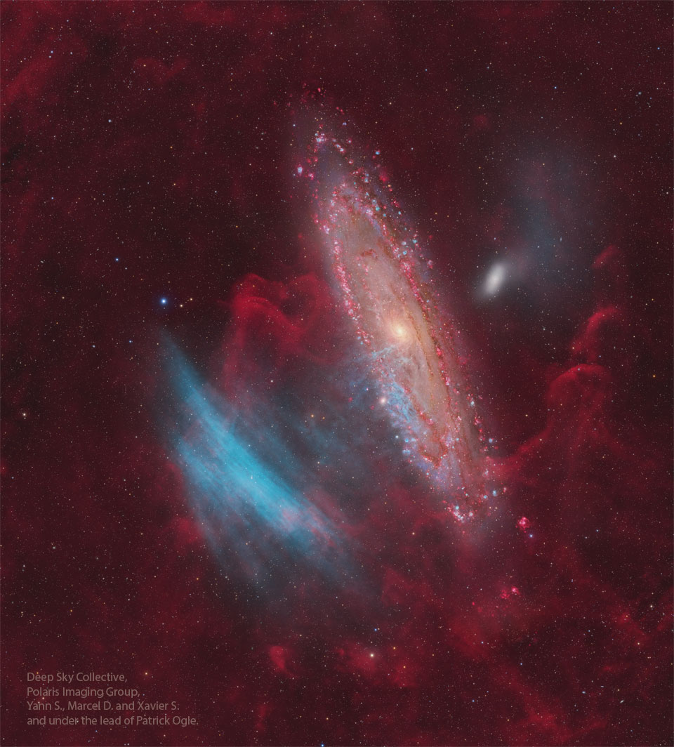 The Andromeda Galaxy is shown just right of centre,
while some unusual blue arcs appear to its left. 
Please see the explanation for more detailed information.