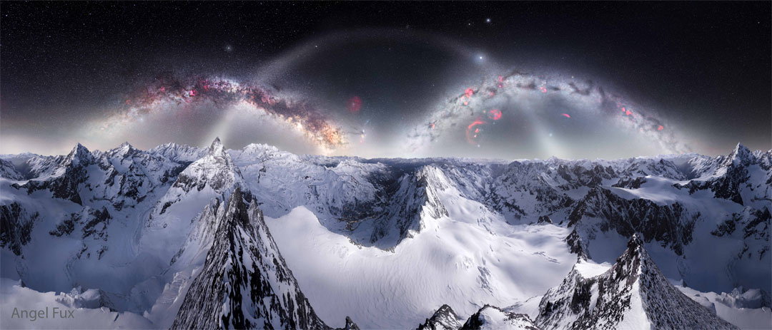 A starry sky is seen above snowy mountains. In the
sky three arches are visible, with the Milky Way on either side
and zodiacal light in the centre. 
Please see the explanation for more detailed information.